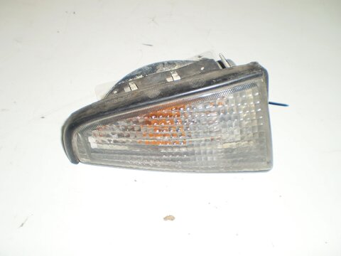 Blikač přední levý L kouřový